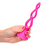 Розовая секс-игрушка елочка Booty Call Silicone Triple Probe в руке